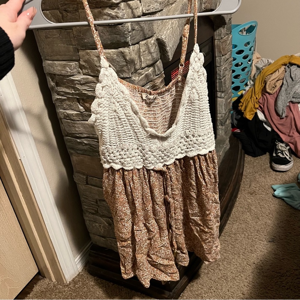 Blush size M. Romper! Floral design on bottom. VERY SHORT.